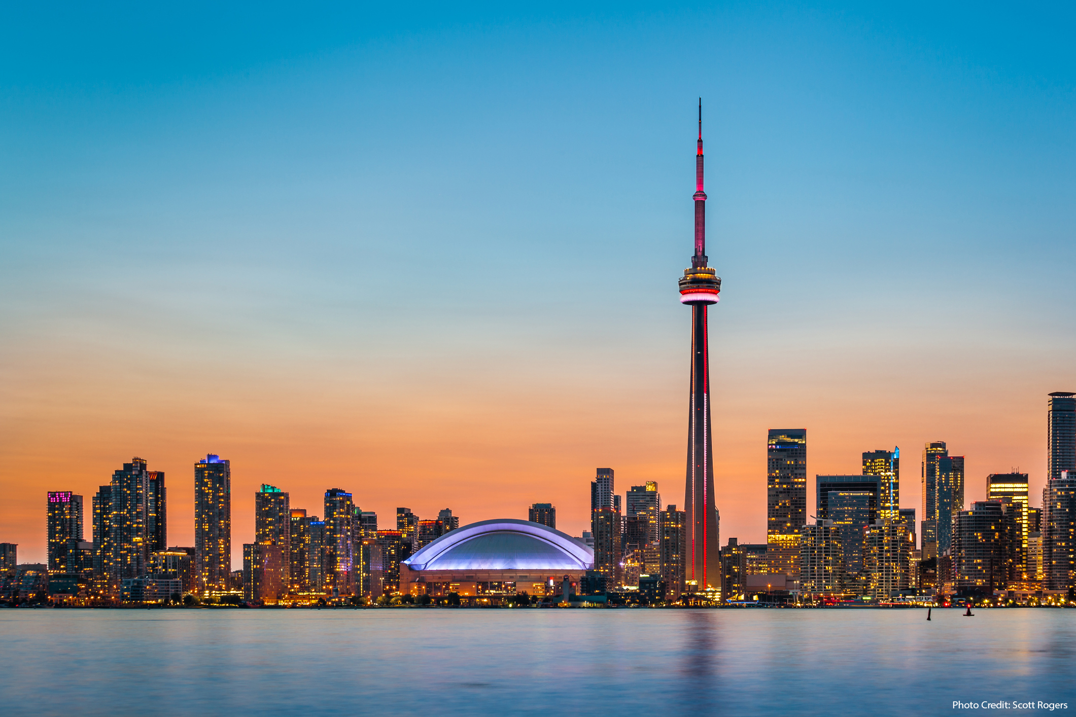 Skyline of Toronto over Ontario Lake at twilight